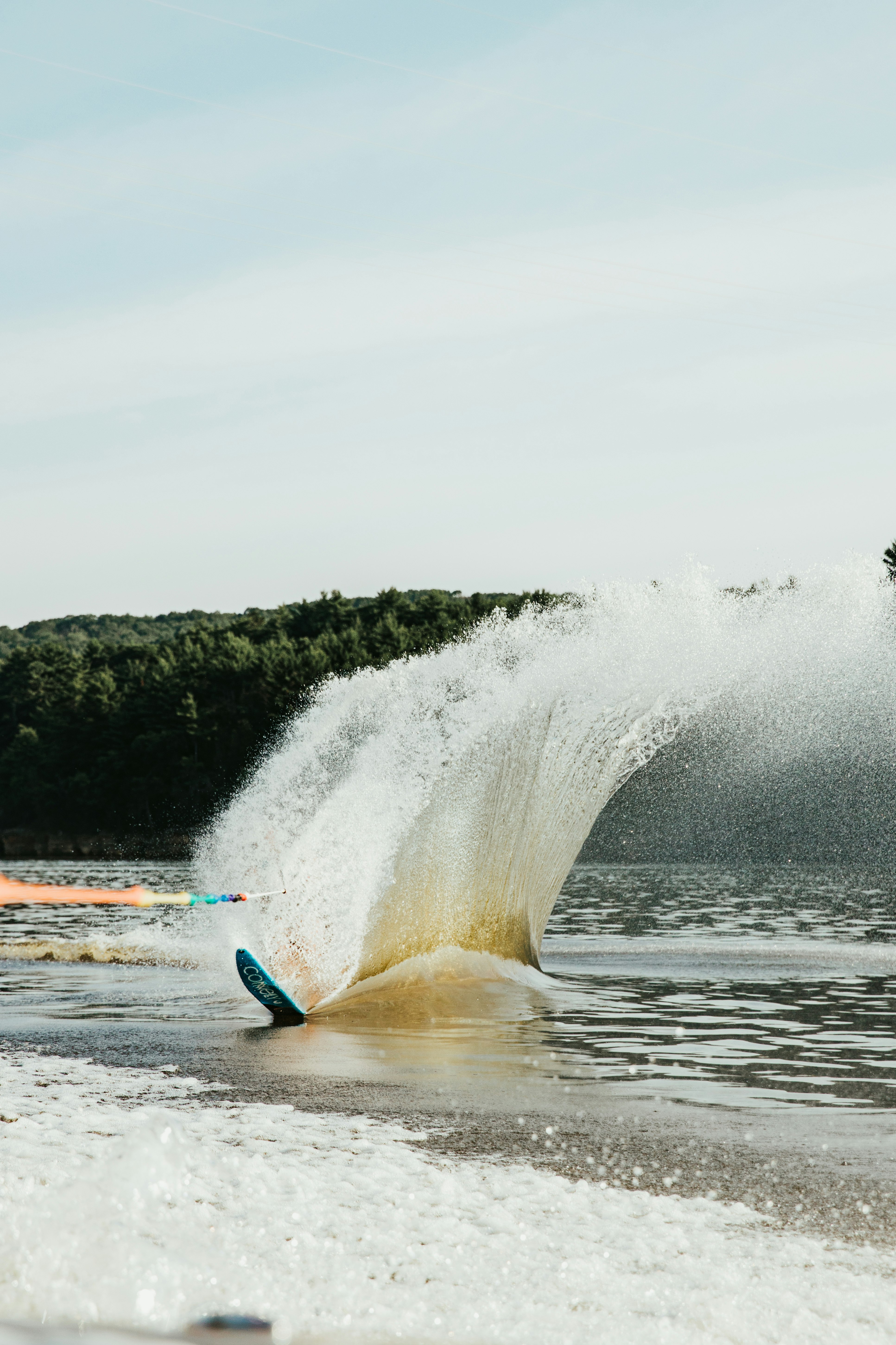 person surfing on sea waves during daytime